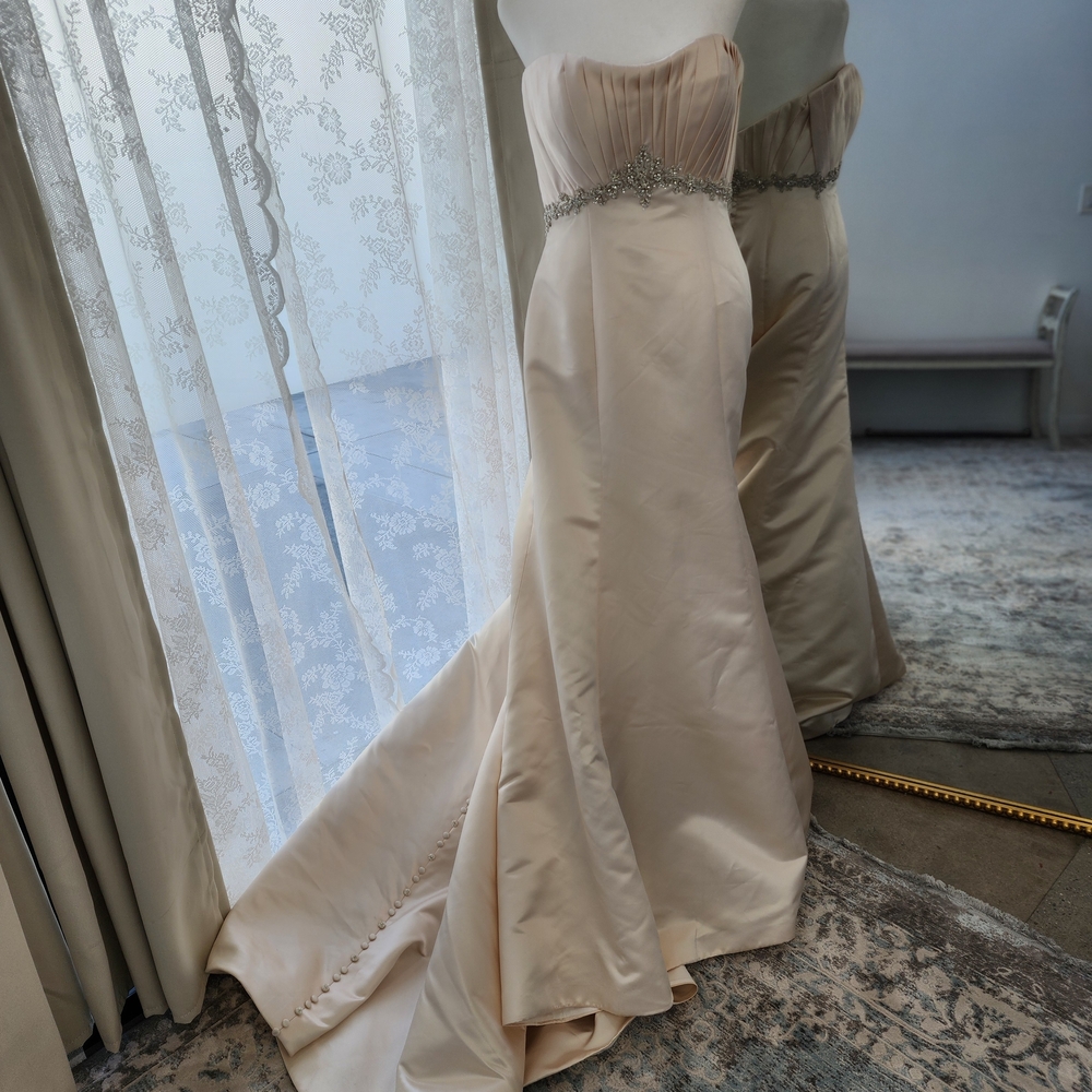 Elegant Strapless Gown with Embellished Waist